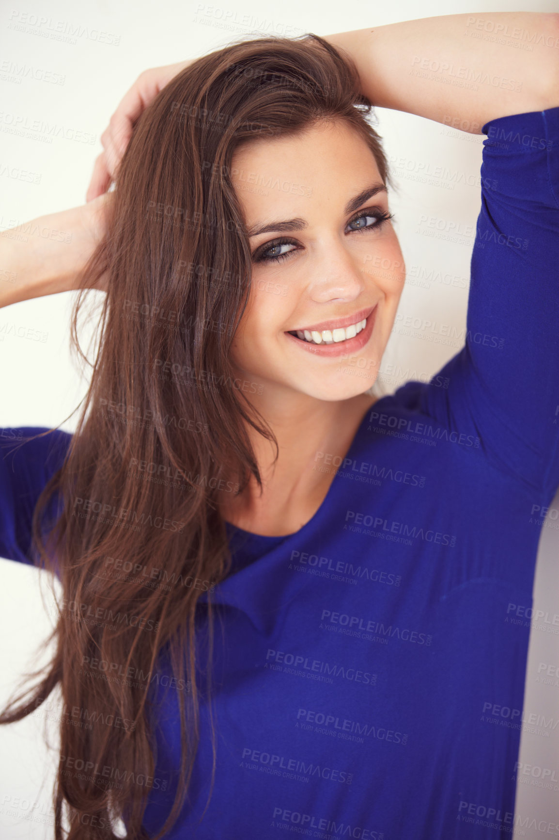 Buy stock photo Cropped young woman smiling while looking at the camera