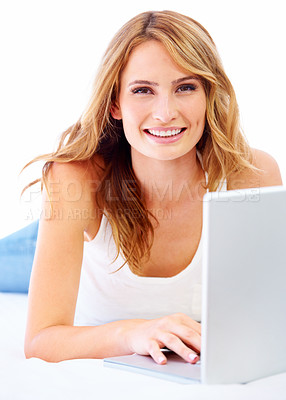 Buy stock photo Woman, laptop and portrait in studio typing for online connection, floor on white background. Female person, model and face for mockup space for digital learning or social media blog, research on web