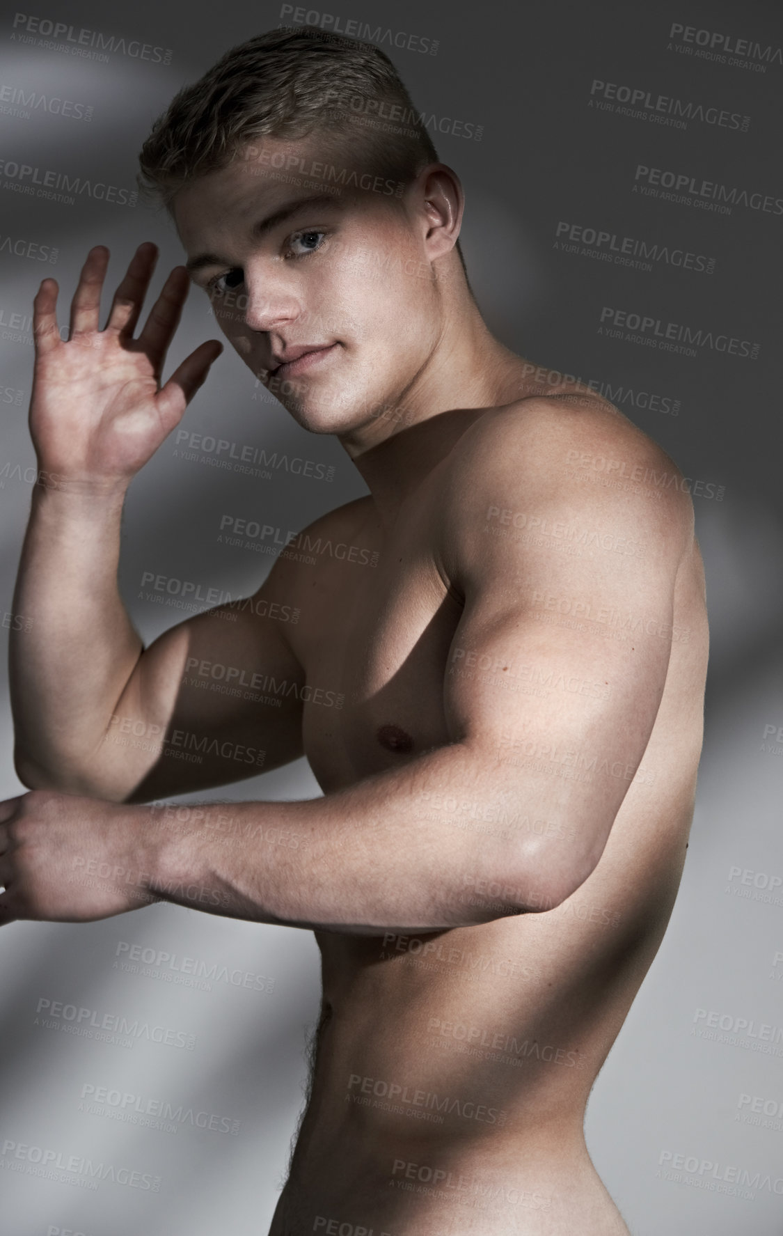 Buy stock photo Man, topless and muscle in studio portrait, hand or wellness for healthy body by white background. Person, shirtless model and exercise for bodybuilder with pride, strong or development for aesthetic