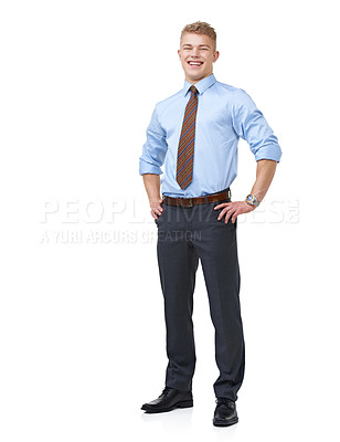 Buy stock photo A young businessman in a shirt and tie with his hands on his hips