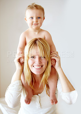 Buy stock photo Portrait, mother and carrying baby on shoulders in house bedroom for fun, games and playing. Smile, happy and woman holding toddler in trust, support and love for development, growth and family home
