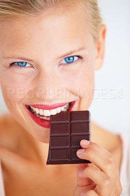 Buy stock photo Portrait, woman happiness and eating dark chocolate bar, tasty cocoa snack or unhealthy junk food, dessert or sweets. Diet craving, antioxidants benefits and model face, smile or happy for cacao slab