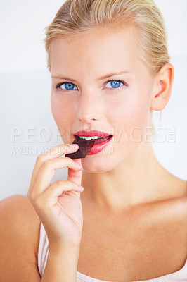 Buy stock photo Candy woman, portrait and eating chocolate bar, delicious snack or studio wellness treat, junk food or dessert. Headshot, sugar addiction temptation and female person cacao sweets on white background