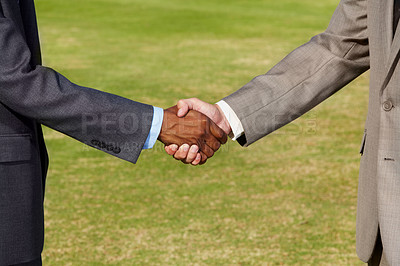 Buy stock photo Closeup, shaking hands and business men on grass for  b2b agreement, welcome and teamwork. Businessman, hand shake and collaboration for goal, deal or together for meeting, partnership or thank you