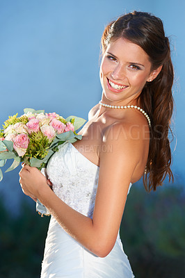 Buy stock photo Bride, wedding portrait and smile outdoor for love, commitment and celebration ceremony with confidence. Jewelry, woman and happy from marriage, romance and formal event in a garden with bouquet