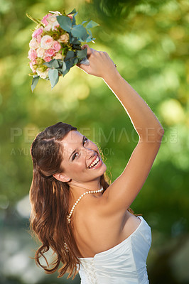 Buy stock photo Woman, throwing and wedding rose bouquet with love, commitment and trust ceremony for marriage. Engagement, celebration and flowers for event in a park with a red floral plant and bride dress outdoor