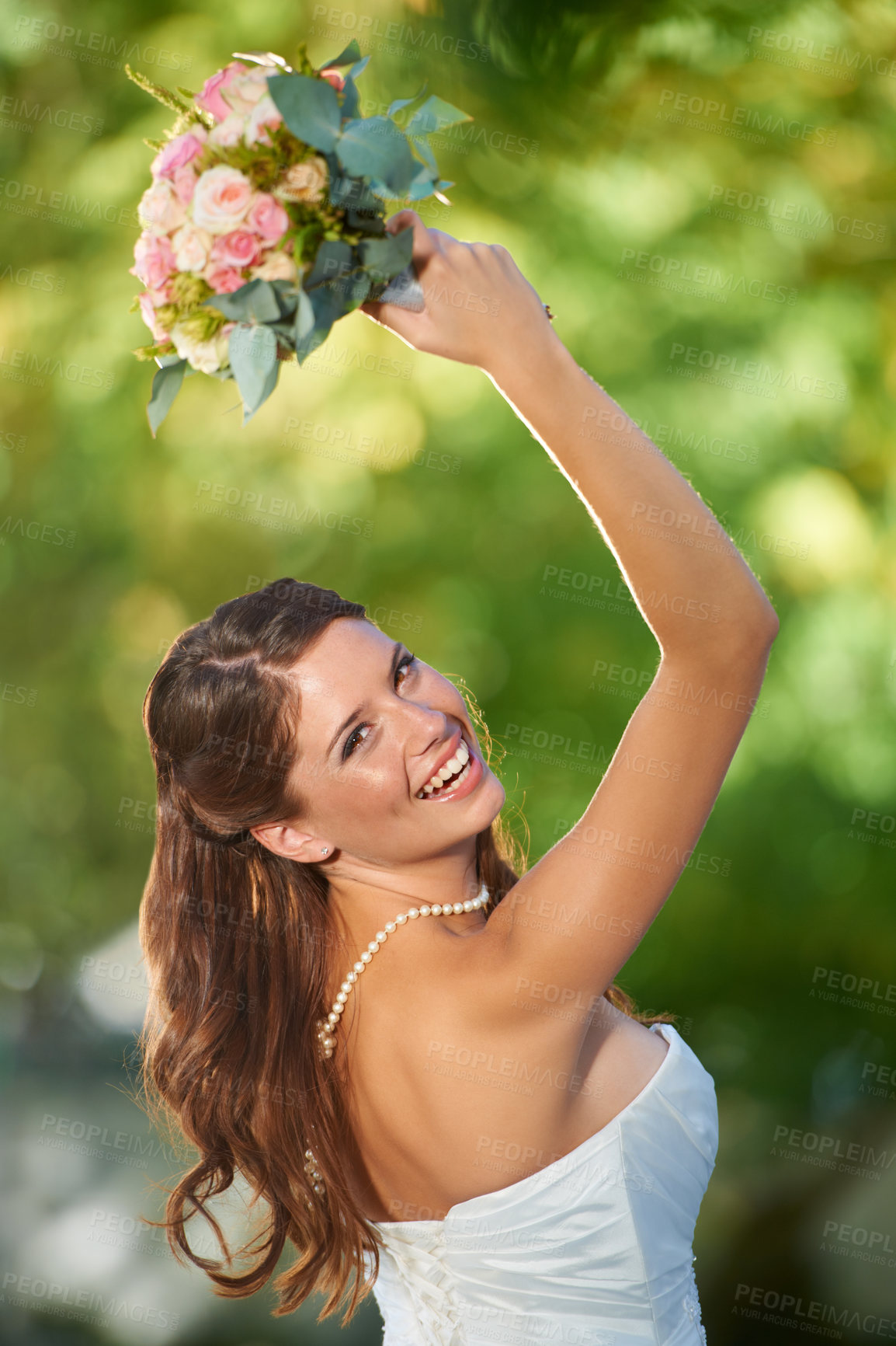 Buy stock photo Woman, throwing and wedding rose bouquet with love, commitment and trust ceremony for marriage. Engagement, celebration and flowers for event in a park with a red floral plant and bride dress outdoor