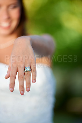 Buy stock photo Bride, woman and hand with wedding ring outdoor for marriage, commitment and celebration with diamond. Love, unity and person in nature with jewelry for ceremony, faith and support on park in summer