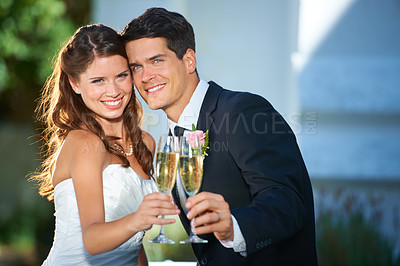 Buy stock photo Happy couple, portrait and champagne cheers at wedding for outdoor marriage celebration, love or commitment. Married man and woman smile with glasses of alcohol for toast, date or honeymoon together