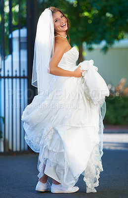 Buy stock photo Outdoor portrait of bride, smile and dress and celebration of love in garden with sneakers. Wedding fashion, marriage event and excited happy woman in driveway with tradition and culture of romance.