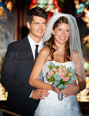 Buy stock photo Happy couple, wedding and bouquet of flowers at church for marriage, love or commitment at ceremony. Married man and woman smile with floral roses and bridal dress for relationship or celebration
