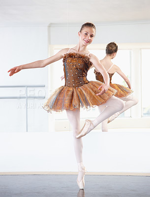 Buy stock photo Full length shot of a young ballerina rehearsing in a studio