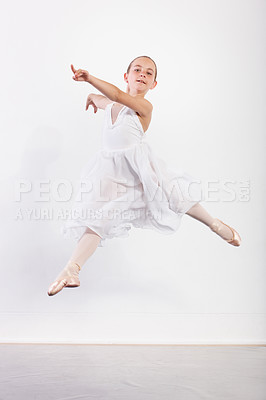Buy stock photo Jumping, portrait and girl in ballet studio with pose, balance and performance class for children. Dance, talent and young ballerina dancer with pride, confidence and creative art at learning academy