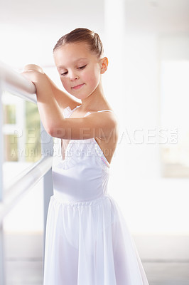 Buy stock photo Young girl, ballerina and ballet class with kid dancer at academy, practice dancing at studio. Female child learning to dance in lesson, creativity with fitness and training, focus and concentration
