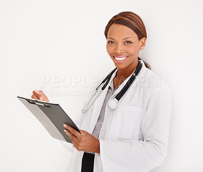 Buy stock photo Doctor portrait, woman with charts and writing of medical documents, report or information of patient history in studio. Face of healthcare worker and clinic folder or checklist on a white background
