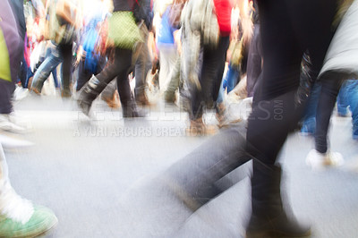 Buy stock photo Blurred shot of protestors marching for their cause