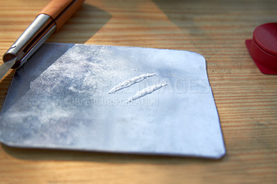 Buy stock photo Closeup shot of two lines of cocaine