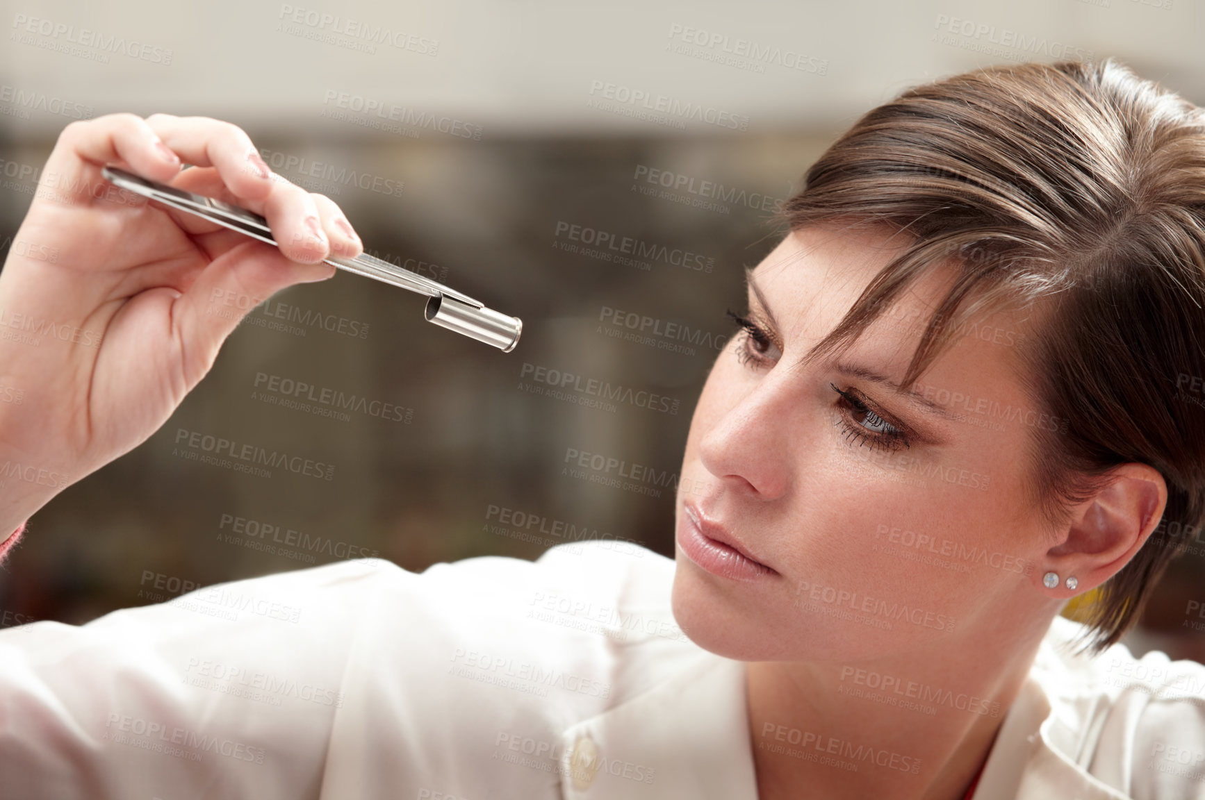 Buy stock photo Forensic scientist, woman and bullet investigation for finger print, dna and research. Focus, female professional and investigator on a crime scene with gun shell and lab work for detective case