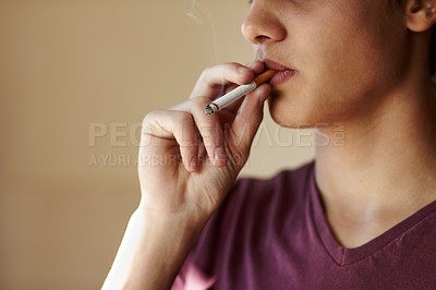 Buy stock photo Teenager, hand and cigarette closeup for smoking student unhealthy habit, dangerous or addiction. Male person, fingers and tobacco risk or stress management for lungs pain, bad quit problem of cancer