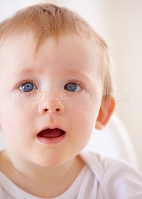 Buy stock photo Face, children and a baby in a high chair at feeding time for health, diet or nutrition in his home. Kids, hungry and an adorable young infant boy in a seat for a meal, growth or child development