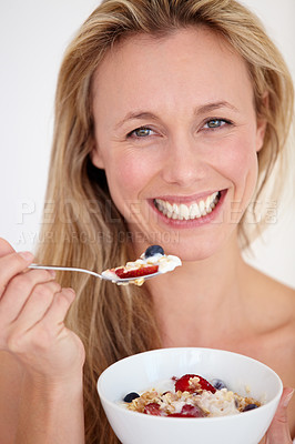 Buy stock photo Happy woman, portrait and muesli bowl for diet, nutrition or health and wellness against a studio background. Female person, blonde or model smile with healthy cereal or natural food for breakfast