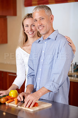 Buy stock photo Kitchen, cooking and portrait of couple with vegetables for healthy dinner, lunch and ingredients. Retirement, marriage and mature man and woman cutting food for bonding, help and meal prep at home