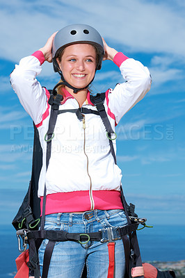 Buy stock photo Beautiful young woman outdoors in skydiving gear