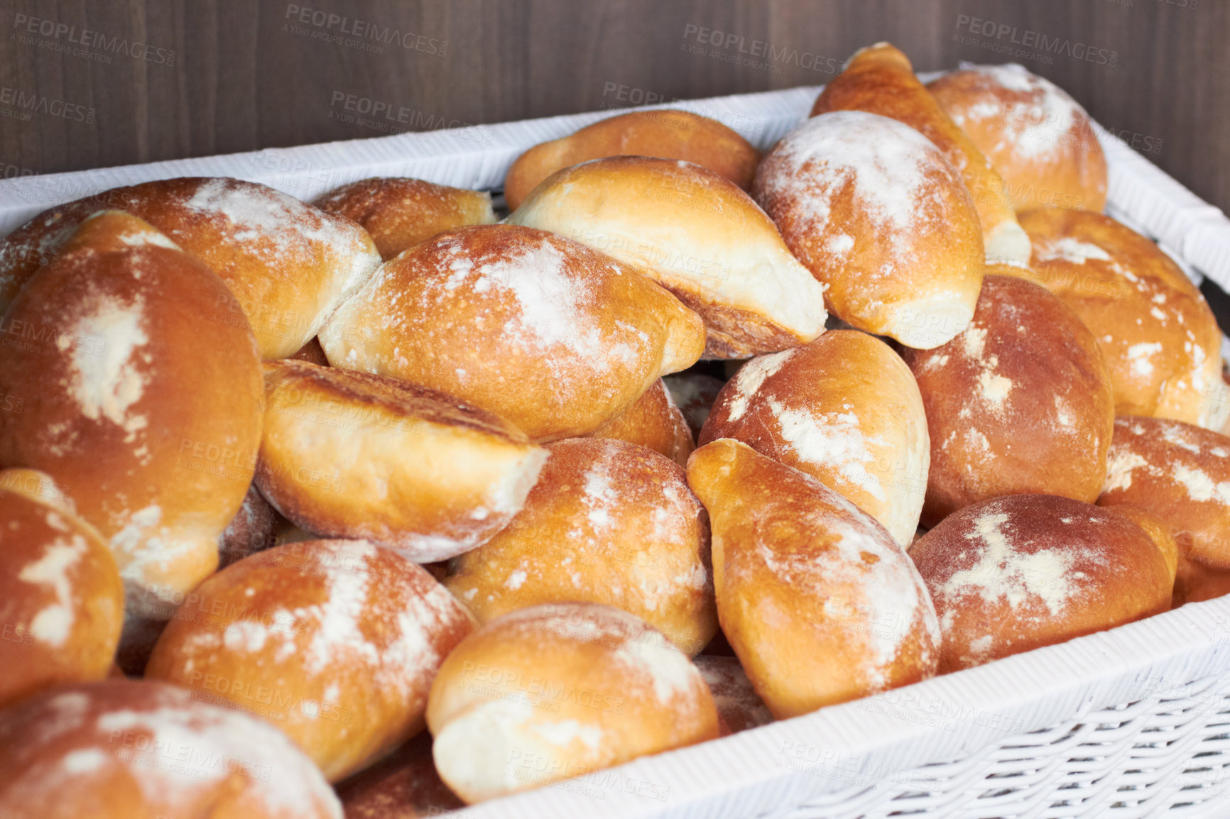 Buy stock photo Flour bread, food and bakery basket of rolls from cooking, catering service, breakfast or baking meal at cafe. Bunch of fresh baked or crispy roll snack for eating, nutrition or fiber in restaurant