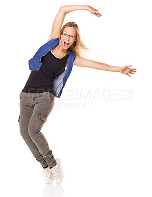 Buy stock photo Woman dancer, studio portrait and fashion with smile, glasses and comic happiness by white background with style. Confident model, isolated and funny dancing with trendy jeans, sneakers and clothes
