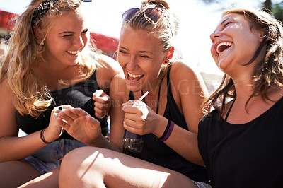 Buy stock photo Festival friends, happiness and women laughing at funny conversation, discussion joke or communication. Humour, comedy people and group wellness smile at social event, outdoor concert or reunion