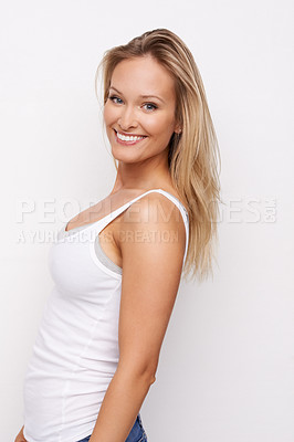 Buy stock photo Happy, studio portrait and woman with fashion, casual wear and relax in trendy apparel t shirt, tank top and cotton fabric clothes. Beautiful girl, stylish and female model outfit on white background