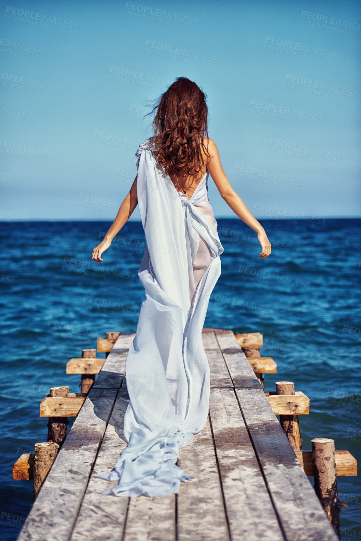 Buy stock photo Woman, elegant and promenade with dress by beach, confident and fashion clothes for trendy designer collection. Model, usa and luxury in chiffon gown for fancy, blue and natural for style by ocean