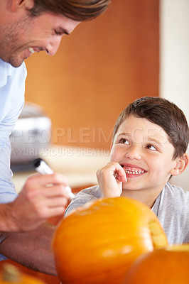 Buy stock photo Halloween, pumpkin and father with kid in the kitchen for holiday celebration at home. Creative, smile and happy dad with boy child bonding and carving vegetable for decoration or tradition at house.
