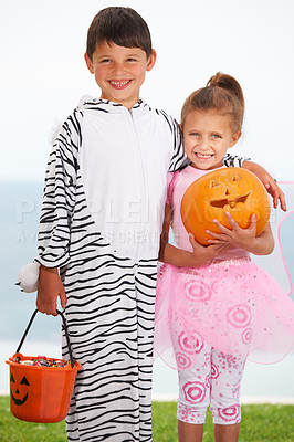 Buy stock photo Portrait of two cute kids dressed up for Halloween
