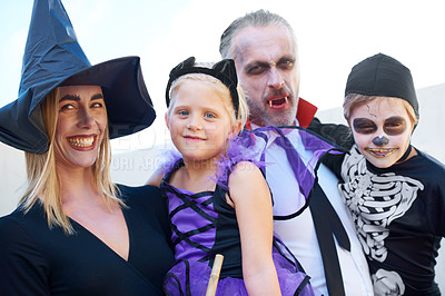 Buy stock photo A fun family dressed up for Hallowe'en, posing together
