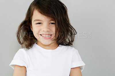 Buy stock photo Portrait of a smiling little boy against a grey background