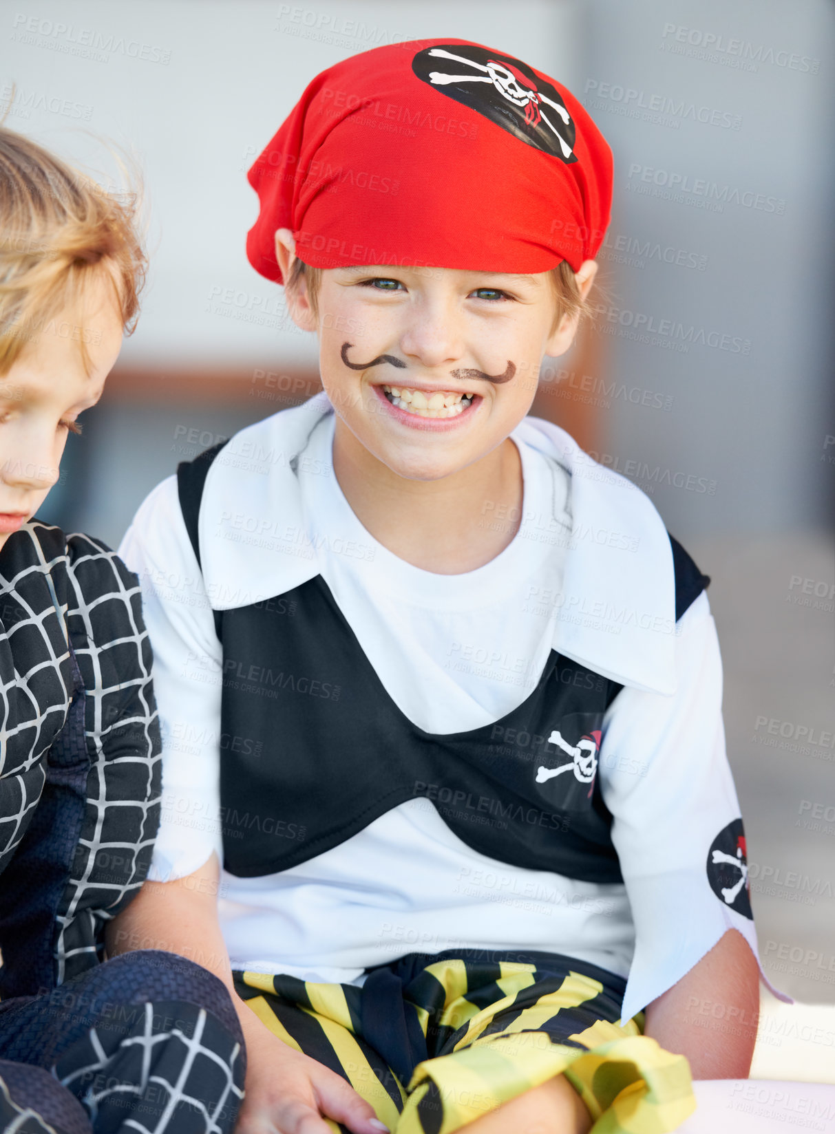 Buy stock photo Portrait, halloween and a boy in a pirate costume for a trick or treat tradition outdoor in his neighborhood. Kids, smile and a happy young male child in a fantasy outfit for holiday celebration