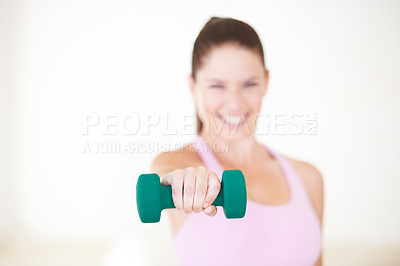 Buy stock photo Woman, hand and dumbbell portrait for gym exercise or workout challenge, fitness training for performance practice. Female person, face and smile or strong weight lifting, progress on wall background