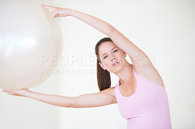 Buy stock photo Portrait, fitness and woman with exercise, ball and stretching with wellness, self care and healthy body. Face, person or girl with equipment, activity or workout with mobility, balance or training