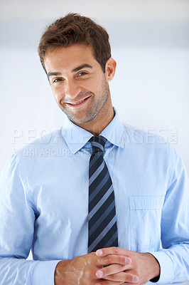 Buy stock photo Businessman, portrait and happy in office for career, professional and employee at corporate job. Entrepreneur, face and person for smile, confidence and pride with calm expression or hands at work