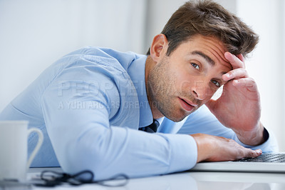 Buy stock photo Tired, desk and portrait of business man in office on laptop working on deadline, project and online report. Corporate, burnout and face of exhausted, fatigue and overworked employee on computer 