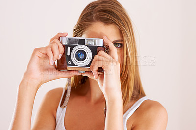 Buy stock photo Photography, woman and retro camera in studio for content creation, magazine photoshoot and paparazzi on white background. Portrait, media and creative photographer with lens for art, skills or hobby