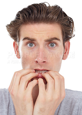 Buy stock photo Stress, anxiety and portrait of a man with worry and fear in a studio biting nails. Isolated, white background and male model face with terror, shock and afraid feeling nervous and anxious with panic
