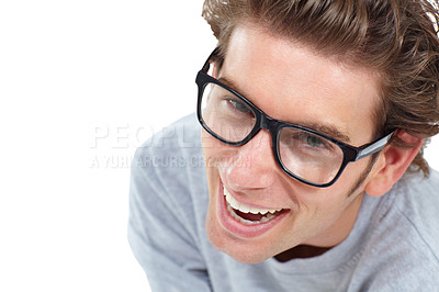 Buy stock photo Young happy man, face and portrait smile with glasses laughing against a white studio background. Closeup of handsome male model smiling or laugh with teeth or spectacles in nerd, funny or geek style