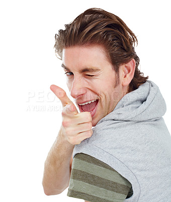 Buy stock photo Pointing, wink and portrait of man in studio for finger gun, approval and choice. Confident, happy and smile with male and hand gesture isolated on white background for success, yes and thank you
