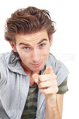 Buy stock photo Face, portrait of man pointing and in a white background. Encouragement or selection, isolated male fashion model showing direction with smirk for confidence and hey you in a studio backdrop