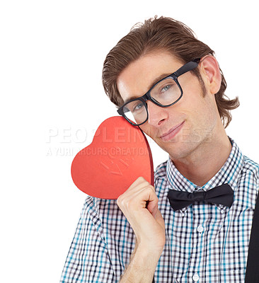 Buy stock photo Love, nerd and portrait of man with heart emoji or icon for romance and valentines day isolated on white background. Smile, happy geek and valentine shape surprise with glasses and bow tie in studio.