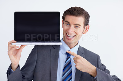 Buy stock photo Mockup, laptop and business man portrait pointing to screen space against a white background. Hands, display and face of male person with computer copy space for advertising, marketing or branding 