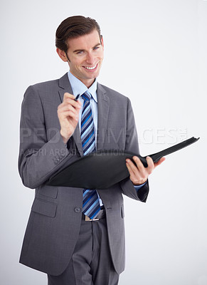 Buy stock photo Portrait, documents and schedule with a business man in studio on a white background for planning or strategy. Smile,  contract or file for paper with a happy young employee in a corporate suit