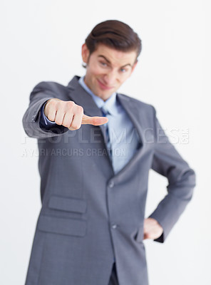 Buy stock photo Hand, vote and thumbs down by unhappy business man in studio with bad news or disappointed on white background. review, fail and male person with negative, feedback and finger emoji for rejection